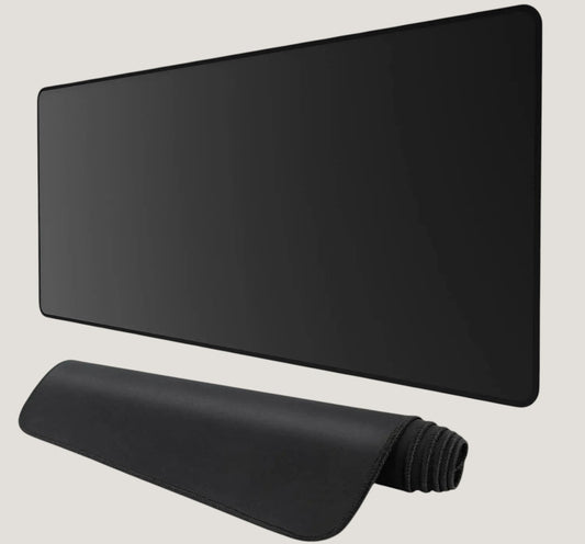 Black Melora extended desk mat with stitched edges and non-slip rubber base