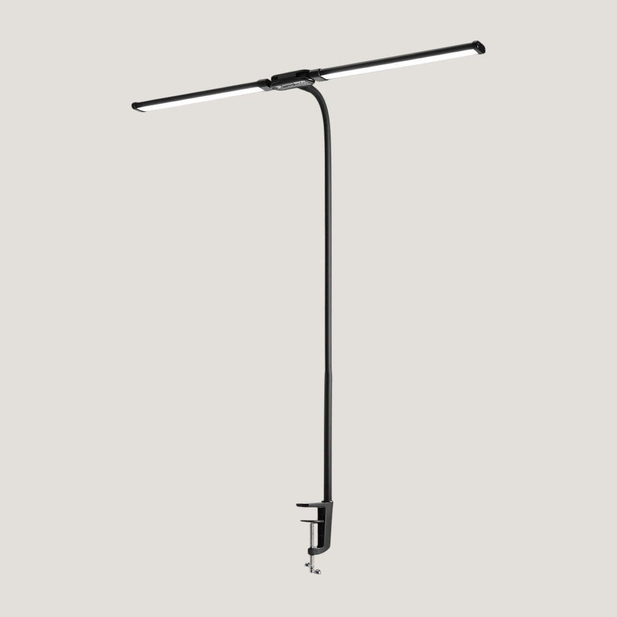 Black Melora desk lamp with two adjustable LED heads and a clamp mount for the desk edge