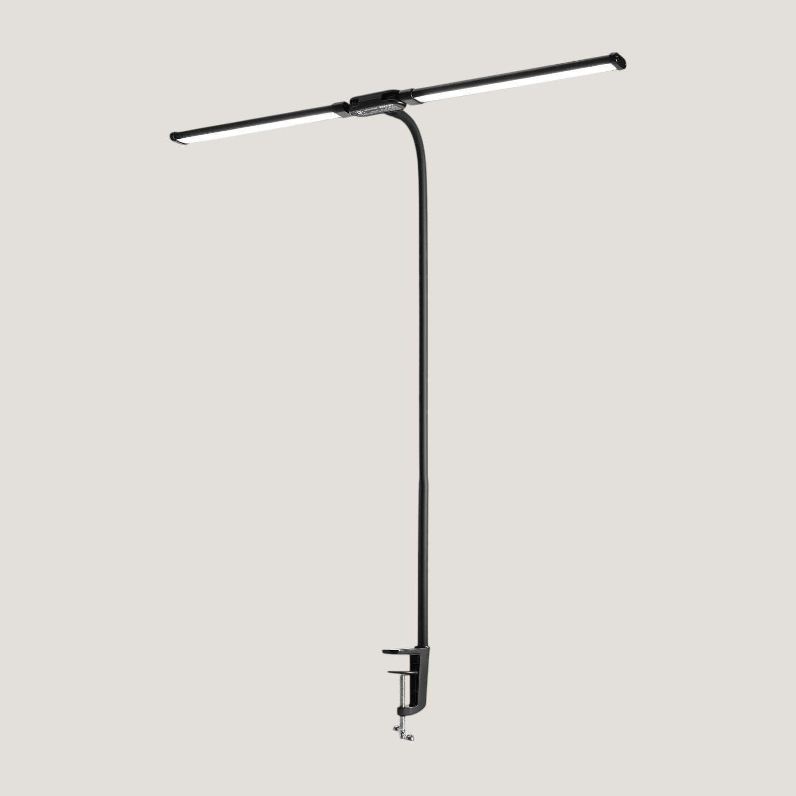 Black Melora desk lamp with two adjustable LED heads and a clamp mount for the desk edge