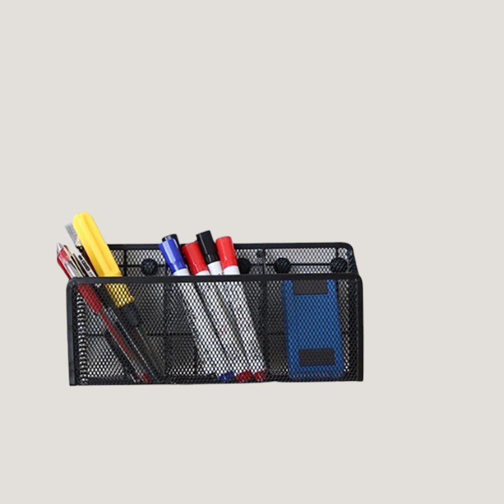 Black Melora magnetic metal mesh organizer holding office supplies on a whiteboard